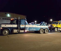 Gas truck getting towed