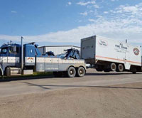 Semi truck getting towed